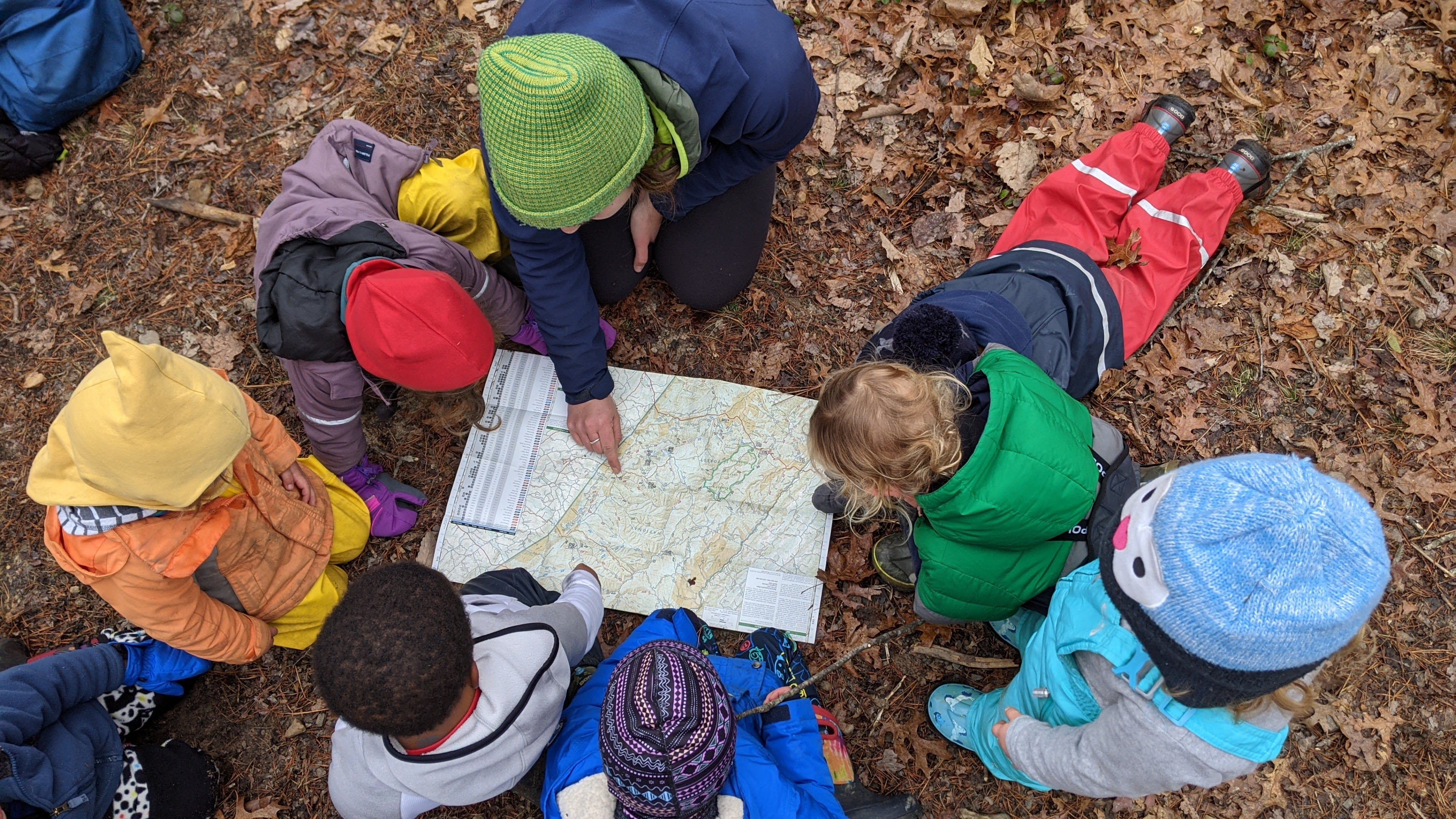 Appalachian Forest School - reading a map as a group
